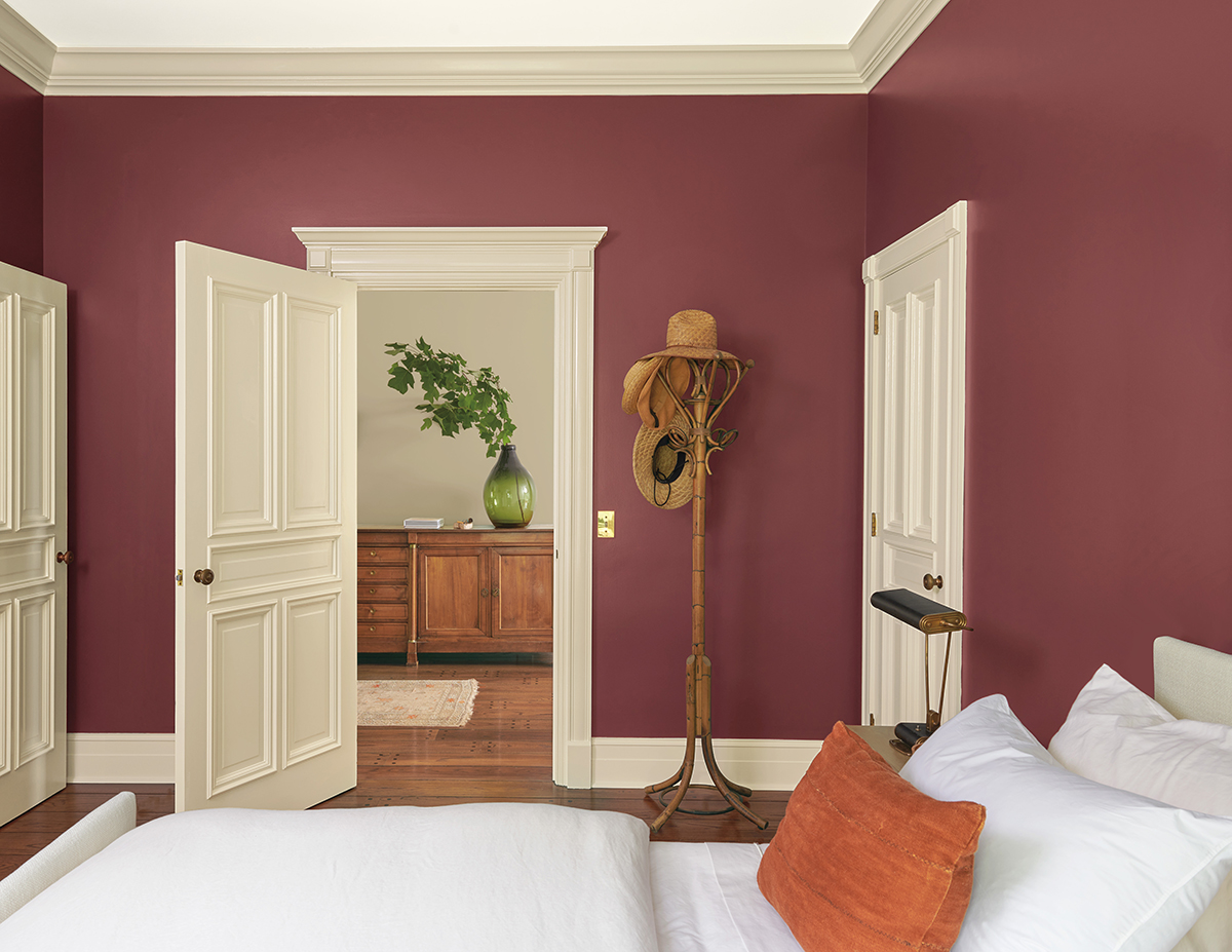 Bedroom painted with Door in Grant Beige HC-83, ADVANCE Semi-Gloss, trim in Grant Beige HC-83, ADVANCE Semi-Gloss, wall Hodley Red HC-65, AURA Eggshell