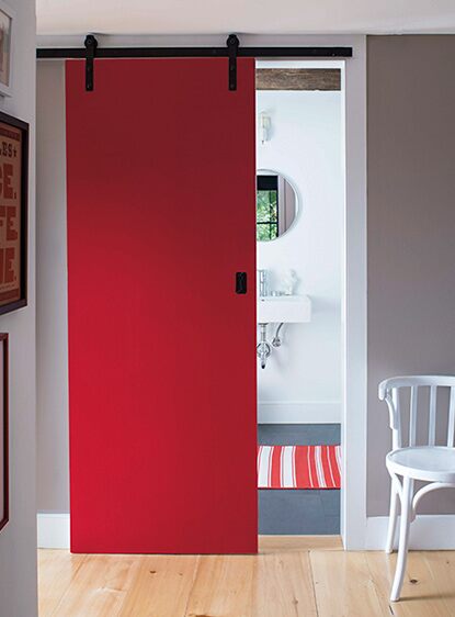 Interior door painted in Benjamin Moore Tomato Tango