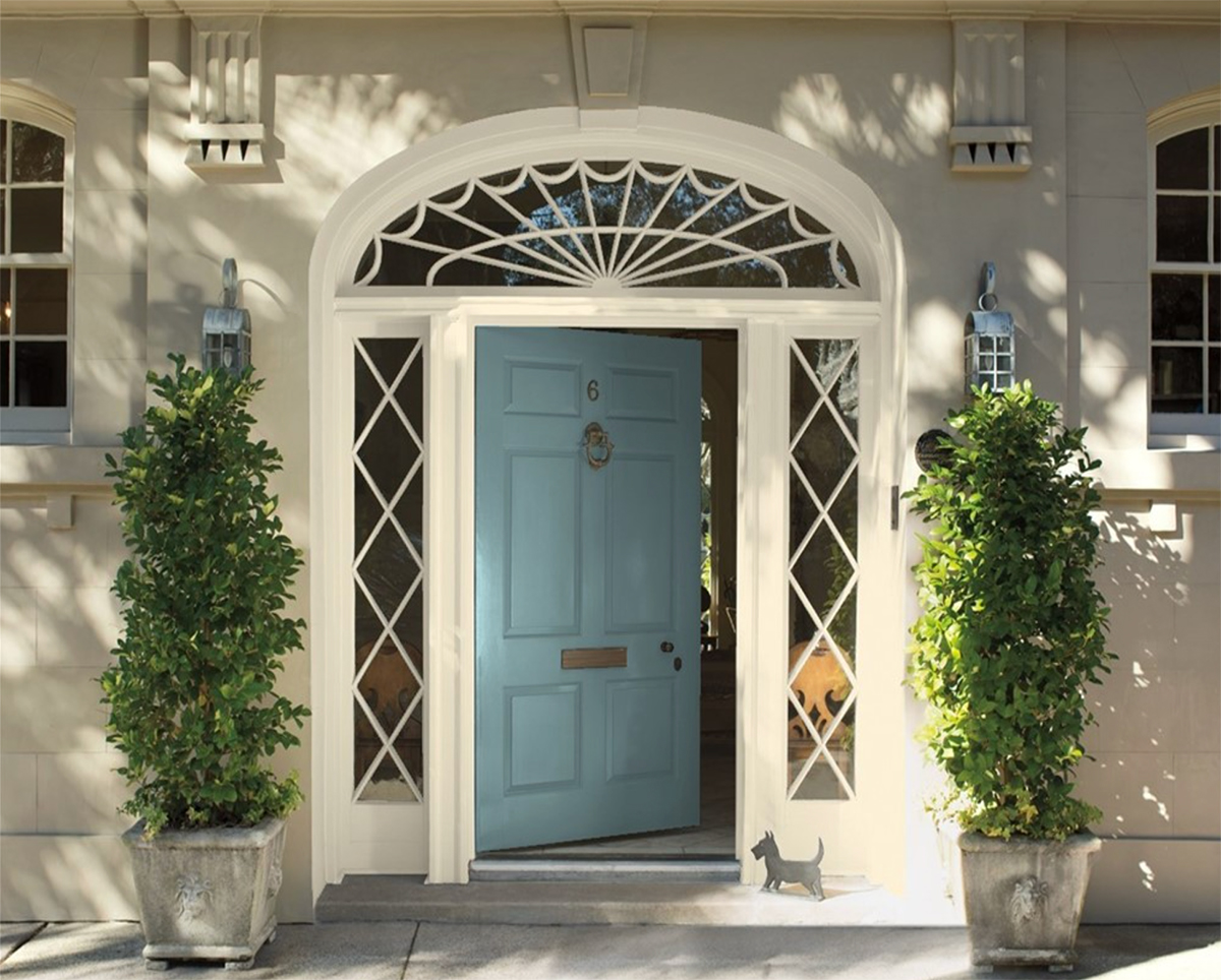 Benjamin Moore Aegean Teal front door trimmed in Palace White OC-100