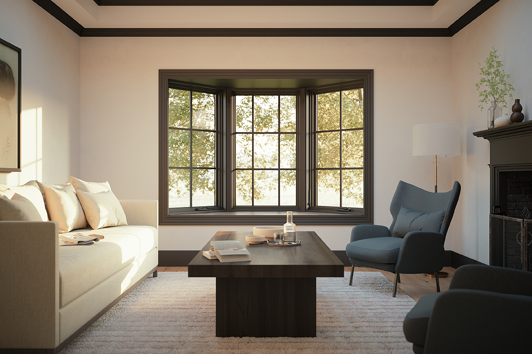 Living room bay window featuring Marvin Elevate Casement windows in bronze