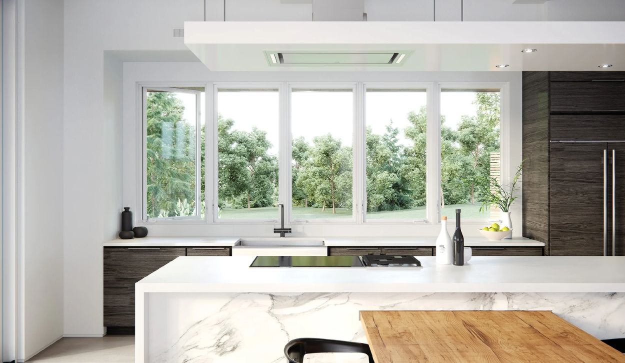 Kitchen featuring a series of crank out casement windows in stone white from Marvin’s Modern Collection