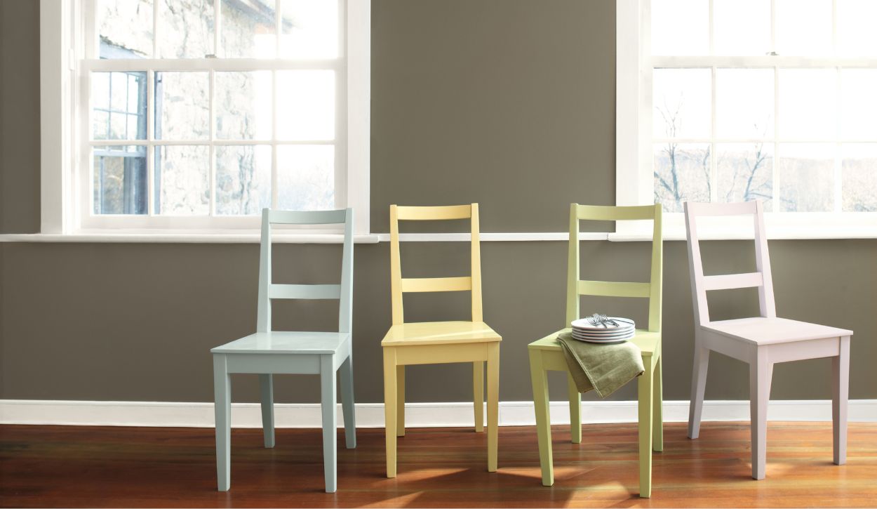 Wood chairs painted in Benjamin Moore Quiet Moments, Pale Moon, Fernwood Green, and Hint of Violet