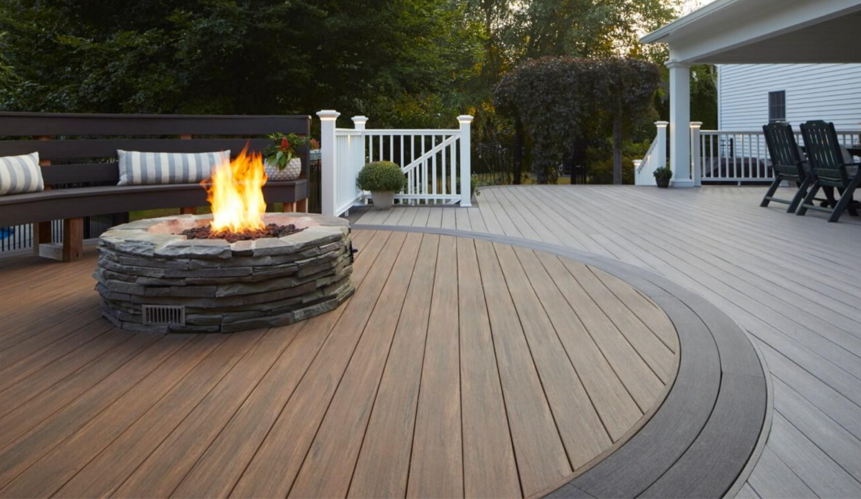 TimberTech Advanced PVC Deck in Weathered Teak, Dark Hickory, and Coastline from the Vintage Collection