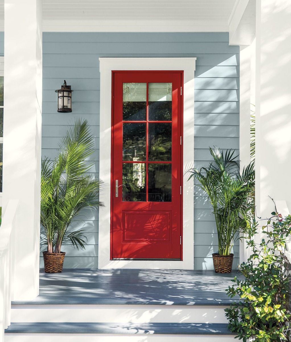 Front door painted red in Benjamin Moore Caliente