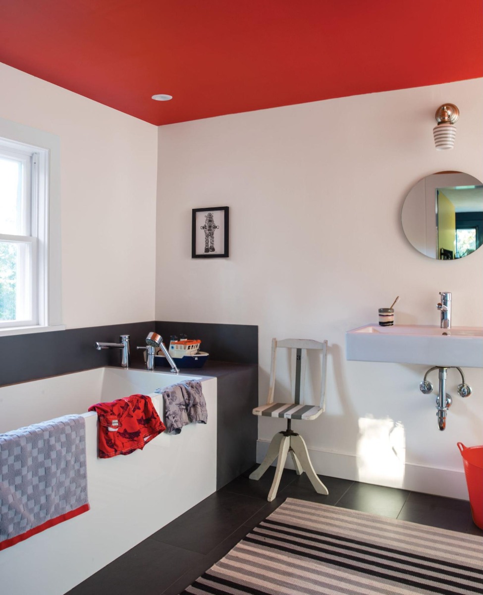 Bathroom painted with Tomato Tango on the ceiling