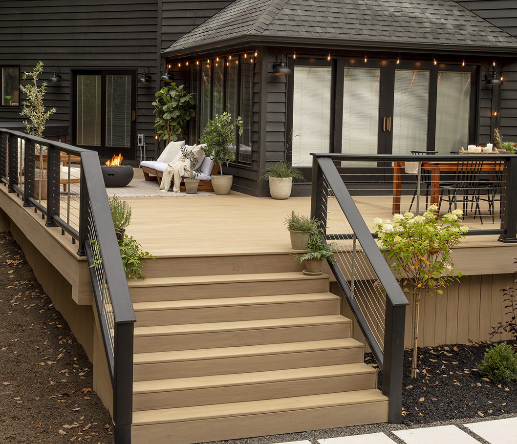 Composite deck stairs in TimberTech Advanced PVC Vintage Collection in Weathered Teak